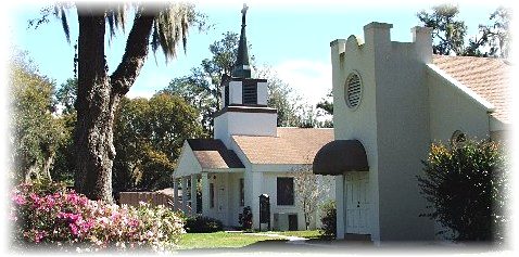 The McLeod Memorial Presbyterian Church campus, with steeple, live oak and azaleas in bloom