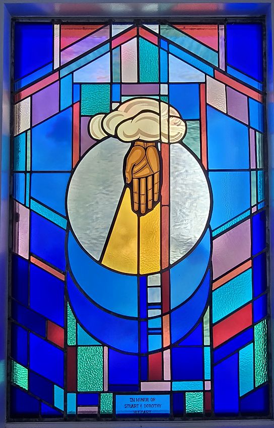 Stained glass window: Hand of God