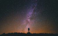 Person Looking at Starry Night Sky